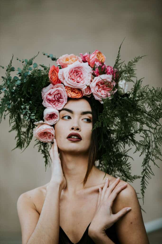 Large gorgeous Flower Head piece designed from Fresh Garden roses by Julia Rose - in Michigan. Photo taken on the steps of the Grand rapids art gallery